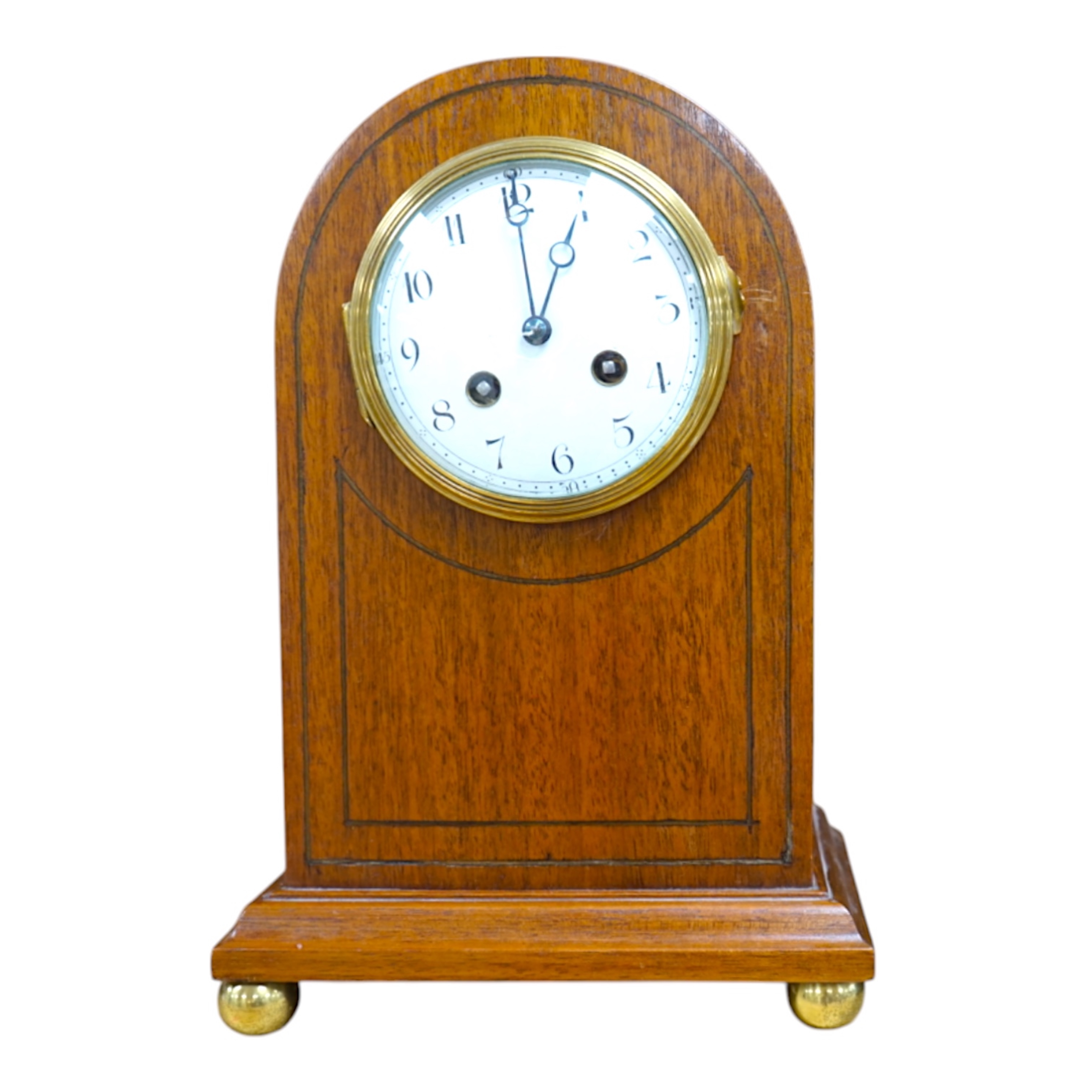 A cased brass carriage timepiece and a dome topped Edwardian mantel clock striking on a coiled gong, backplate stamped BTG, 29.5cm (2) Condition - fair to good.